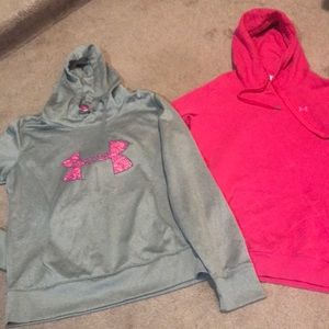 Two women’s large under Armour sweatshirts.
